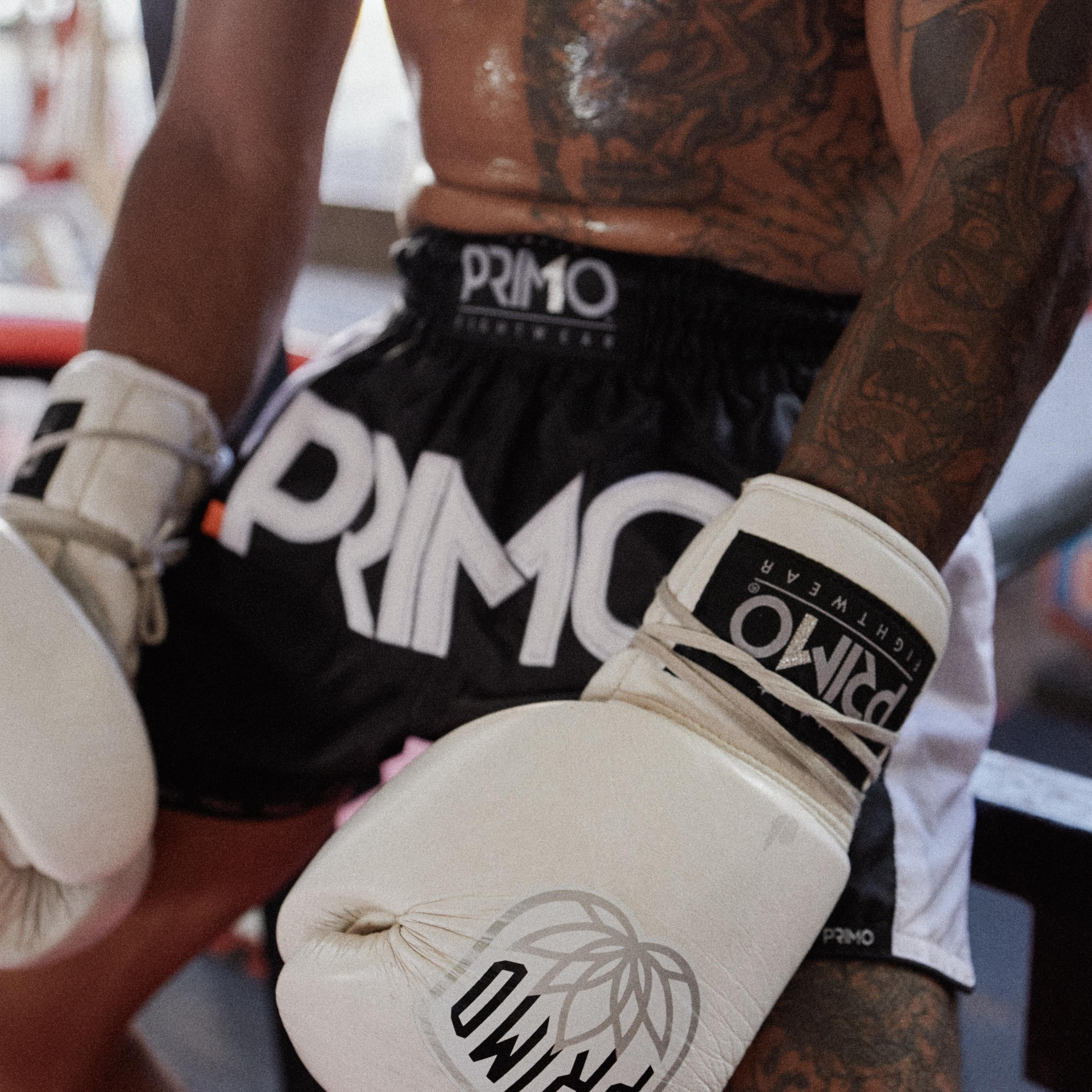 Muay Thai fighter with shorts and gloves