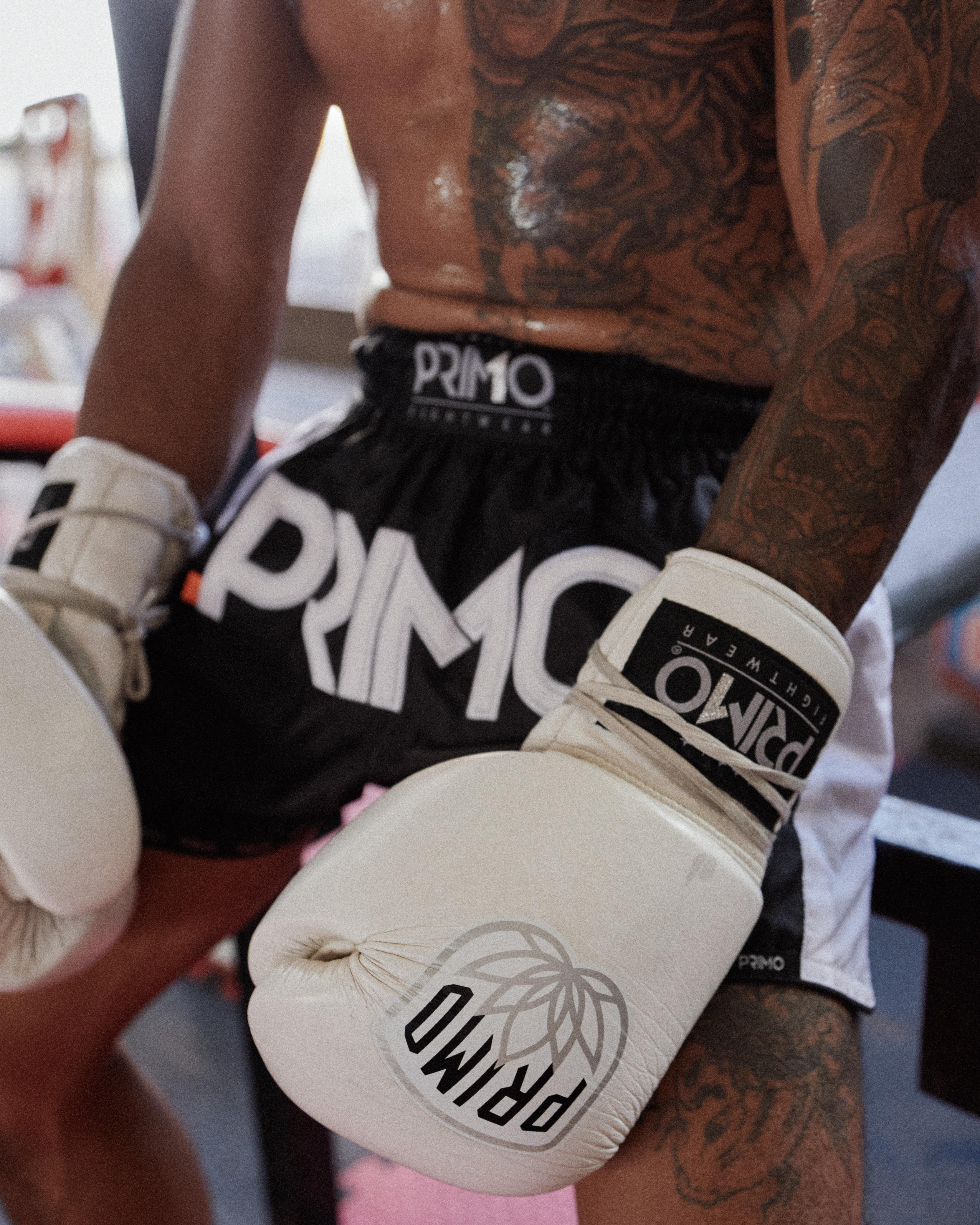Muay Thai fighter with shorts and gloves