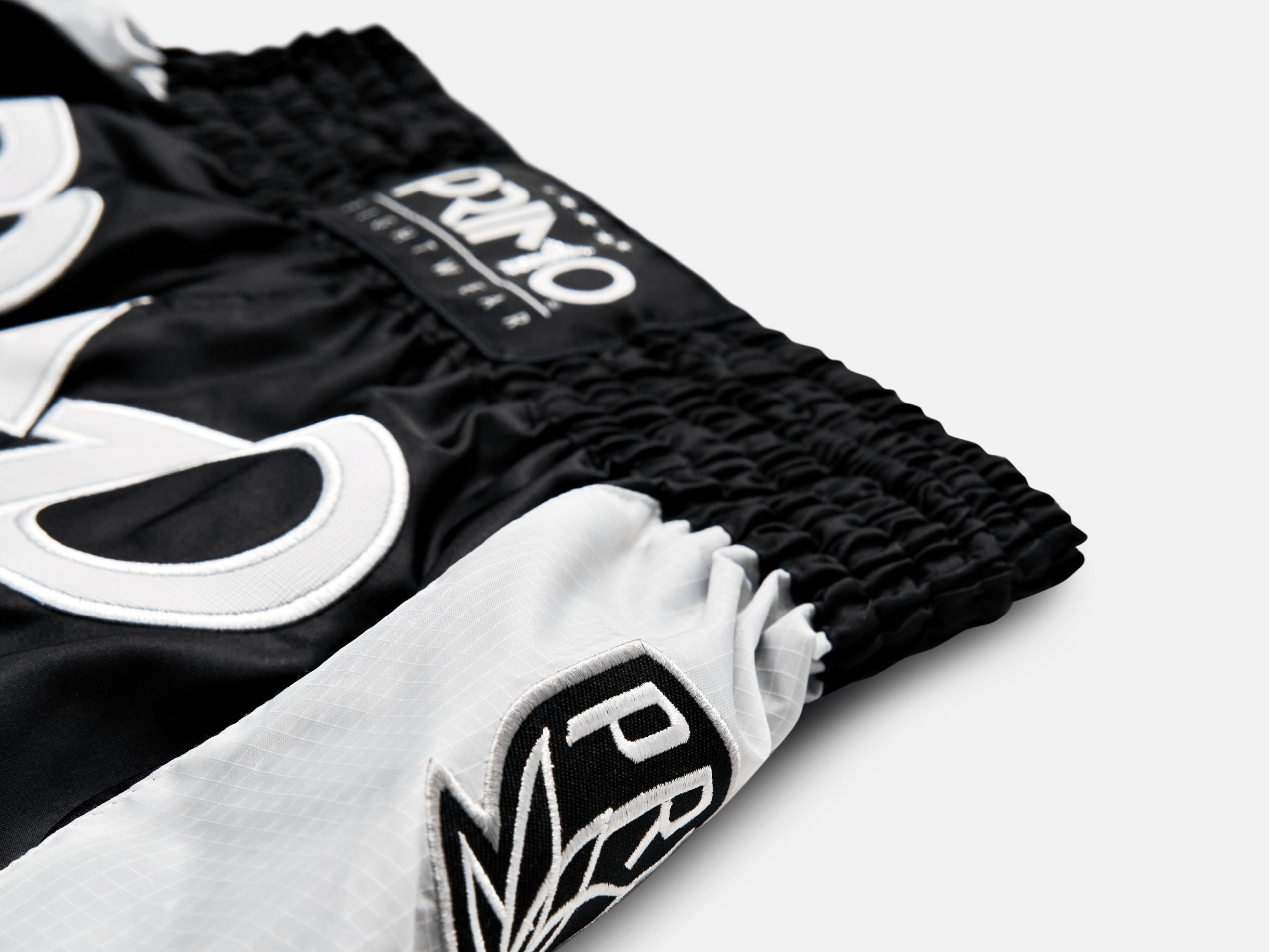 Primo Fight Wear Official Muay Thai Shorts - Free Flow Series - Off Wai