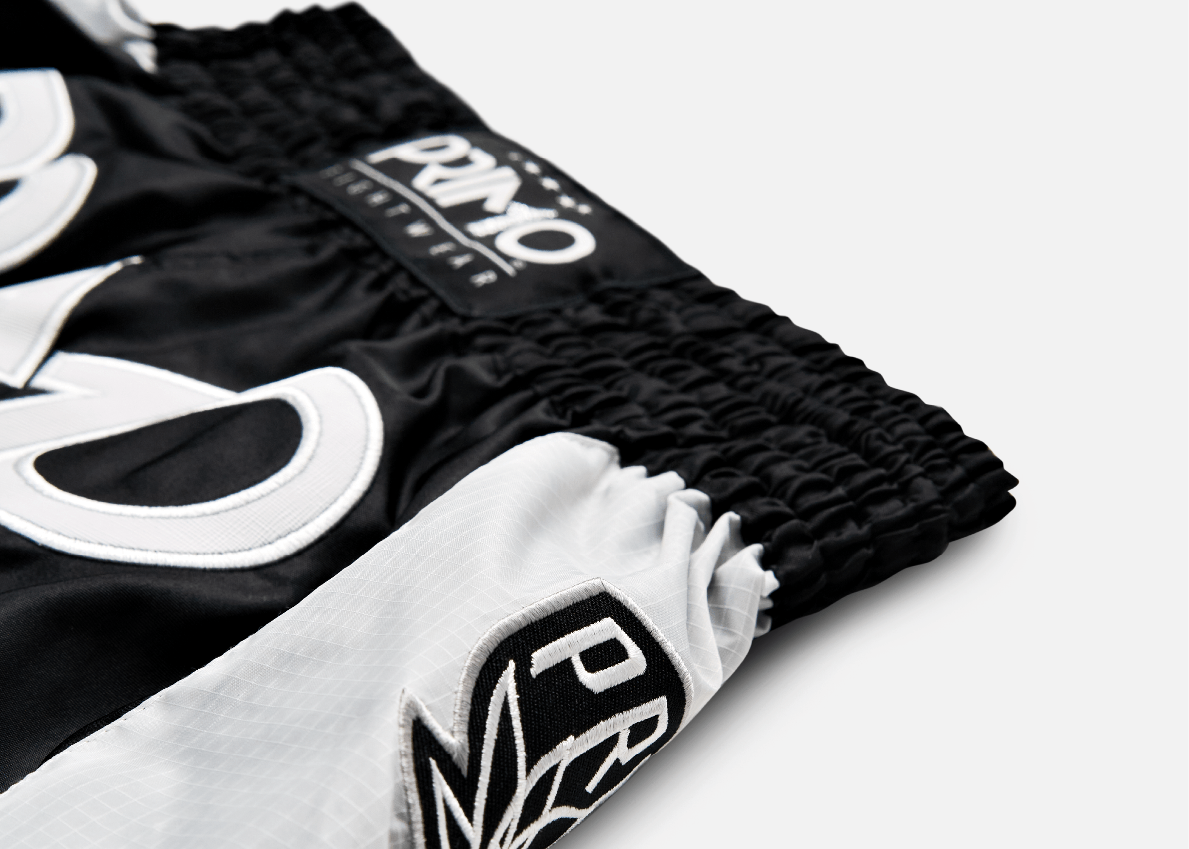 Primo Fight Wear Official Muay Thai Shorts - Free Flow Series - Off Wai